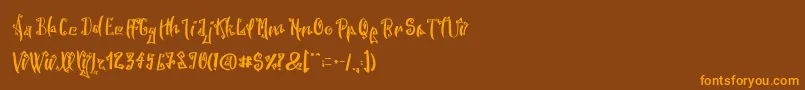 SpookyWookyRegular Font – Orange Fonts on Brown Background