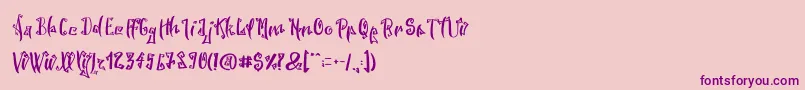 SpookyWookyRegular-Schriftart – Violette Schriften auf rosa Hintergrund