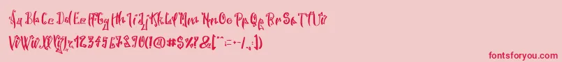 SpookyWookyRegular Font – Red Fonts on Pink Background