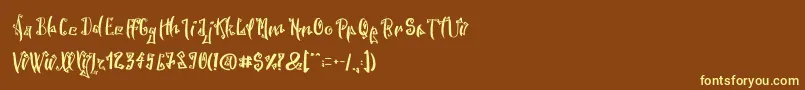 SpookyWookyRegular Font – Yellow Fonts on Brown Background