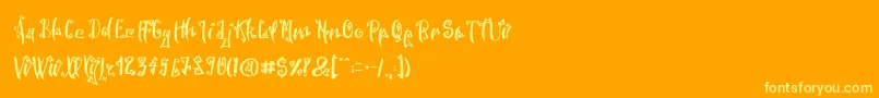 SpookyWookyRegular-Schriftart – Gelbe Schriften auf orangefarbenem Hintergrund