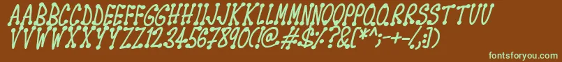 Spotsticks Italic-fontti – vihreät fontit ruskealla taustalla