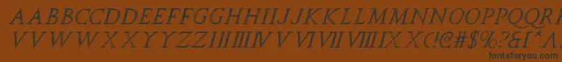 フォントspqri – 黒い文字が茶色の背景にあります