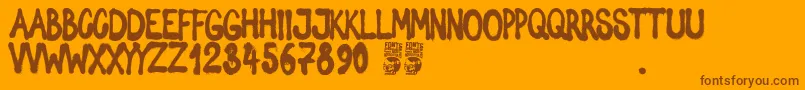 Spray Letters Font – Brown Fonts on Orange Background