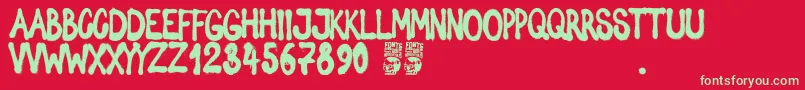 Spray Letters Font – Green Fonts on Red Background