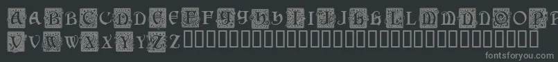 squac   -fontti – harmaat kirjasimet mustalla taustalla