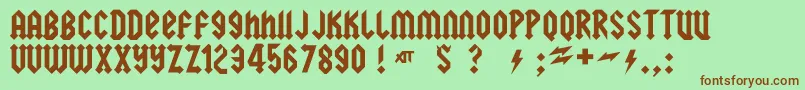 squealer-Schriftart – Braune Schriften auf grünem Hintergrund