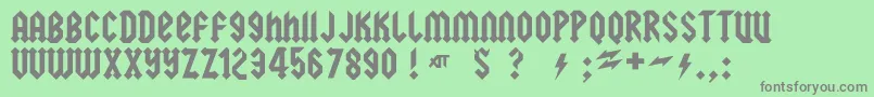 squealer-Schriftart – Graue Schriften auf grünem Hintergrund