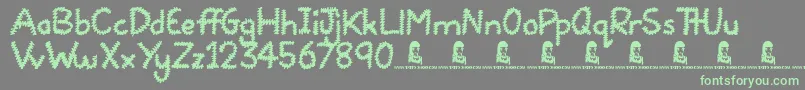Squiggles-Schriftart – Grüne Schriften auf grauem Hintergrund