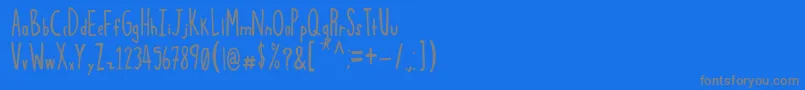 フォントSqwoze – 青い背景に灰色の文字