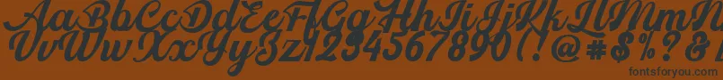 Srikandy Font – Black Fonts on Brown Background