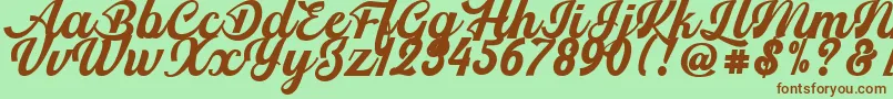 Srikandy Font – Brown Fonts on Green Background