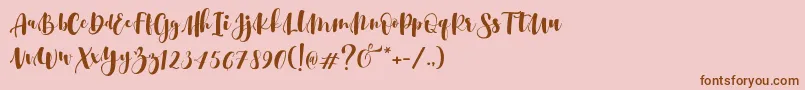 Srikonitta Script Two   Dafont-Schriftart – Braune Schriften auf rosa Hintergrund