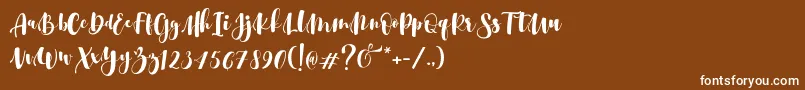 フォントSrikonitta Script Two   Dafont – 茶色の背景に白い文字