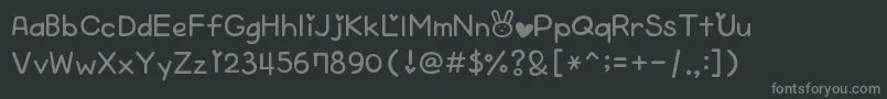 フォントCheekyRabbit – 黒い背景に灰色の文字