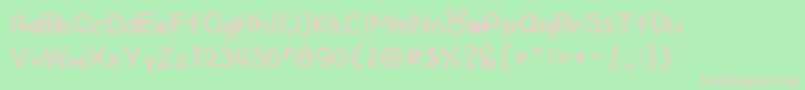 CheekyRabbit-fontti – vaaleanpunaiset fontit vihreällä taustalla