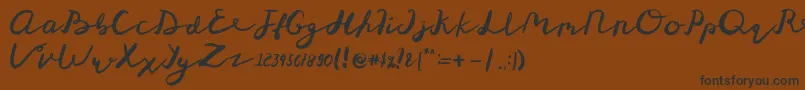 St Maknyus Font – Black Fonts on Brown Background