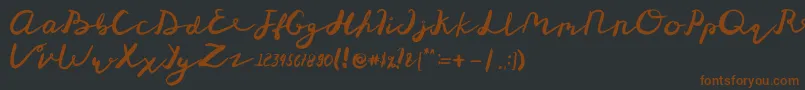 St Maknyus Font – Brown Fonts on Black Background