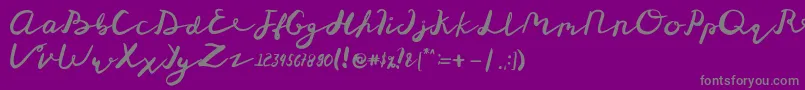 St Maknyus-Schriftart – Graue Schriften auf violettem Hintergrund