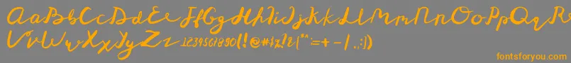 St Maknyus-Schriftart – Orangefarbene Schriften auf grauem Hintergrund
