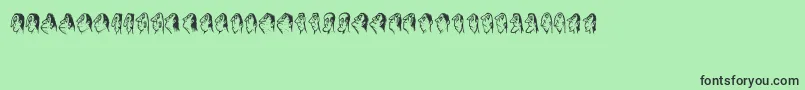 フォントStam – 緑の背景に黒い文字