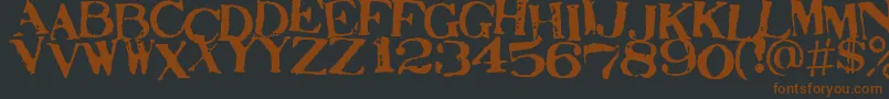 STAMAJ  -fontti – ruskeat fontit mustalla taustalla