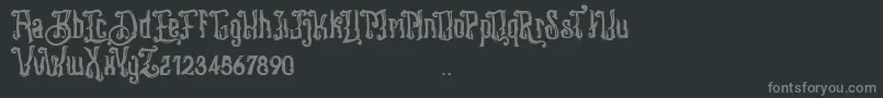 Stangbunder-fontti – harmaat kirjasimet mustalla taustalla