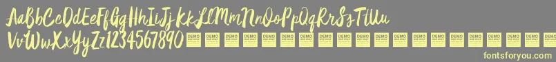 Star Dust   Demo Font – Yellow Fonts on Gray Background