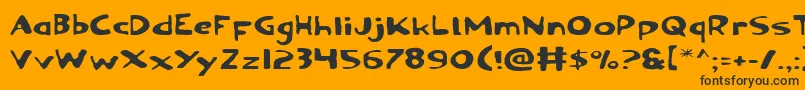 OzymandiasExpanded-Schriftart – Schwarze Schriften auf orangefarbenem Hintergrund