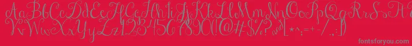 Jandastylishscript-Schriftart – Graue Schriften auf rotem Hintergrund