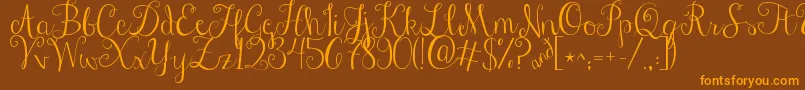 Jandastylishscript Font – Orange Fonts on Brown Background