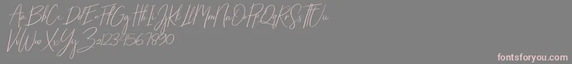 Starlights Italic-Schriftart – Rosa Schriften auf grauem Hintergrund