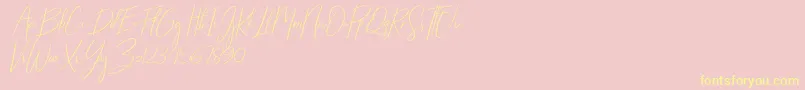 Fonte Starlights Italic – fontes amarelas em um fundo rosa