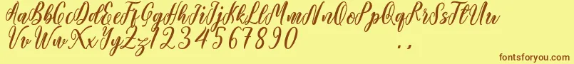 Шрифт Starlove Demo – коричневые шрифты на жёлтом фоне