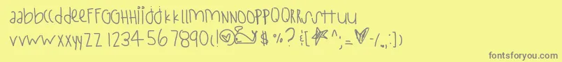 フォントStayStrong – 黄色の背景に灰色の文字