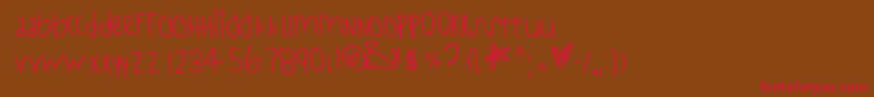 StayStrong Font – Red Fonts on Brown Background
