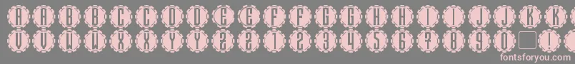 Steamcog Caps Font – Pink Fonts on Gray Background