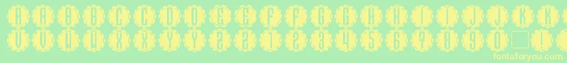 フォントSteamcog Caps – 黄色の文字が緑の背景にあります