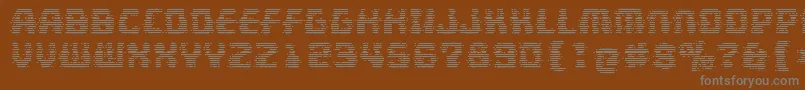 MultivacGhost-fontti – harmaat kirjasimet ruskealla taustalla