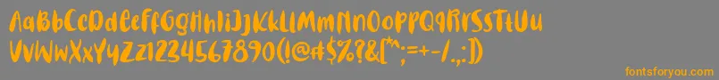 Шрифт Steaming Grill Font – оранжевые шрифты на сером фоне