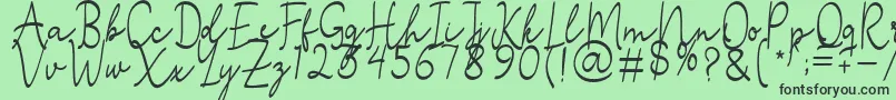 フォントStefian Script 2 – 緑の背景に黒い文字
