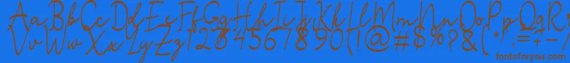 Stefian Script 2-Schriftart – Braune Schriften auf blauem Hintergrund