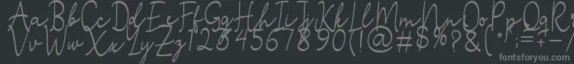 フォントStefian Script 2 – 黒い背景に灰色の文字