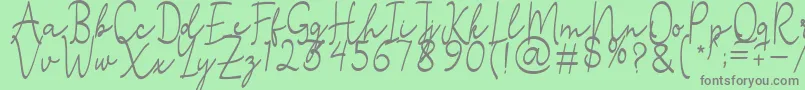 Fonte Stefian Script 2 – fontes cinzas em um fundo verde