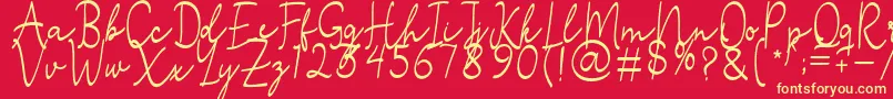 フォントStefian Script 2 – 黄色の文字、赤い背景