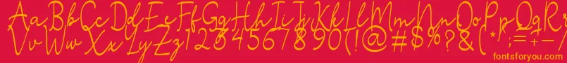 Stefian Script 2-Schriftart – Orangefarbene Schriften auf rotem Hintergrund