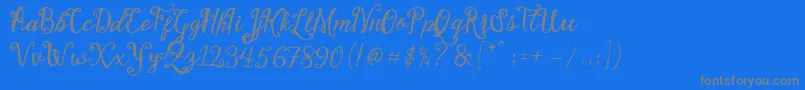 Stellanova Script Free Demo-Schriftart – Graue Schriften auf blauem Hintergrund