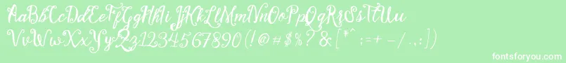 Stellanova Script Free Demo-fontti – valkoiset fontit vihreällä taustalla