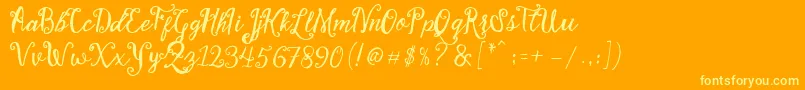 フォントStellanova Script Free Demo – オレンジの背景に黄色の文字