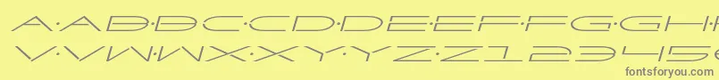 フォントFactorexpandital – 黄色の背景に灰色の文字